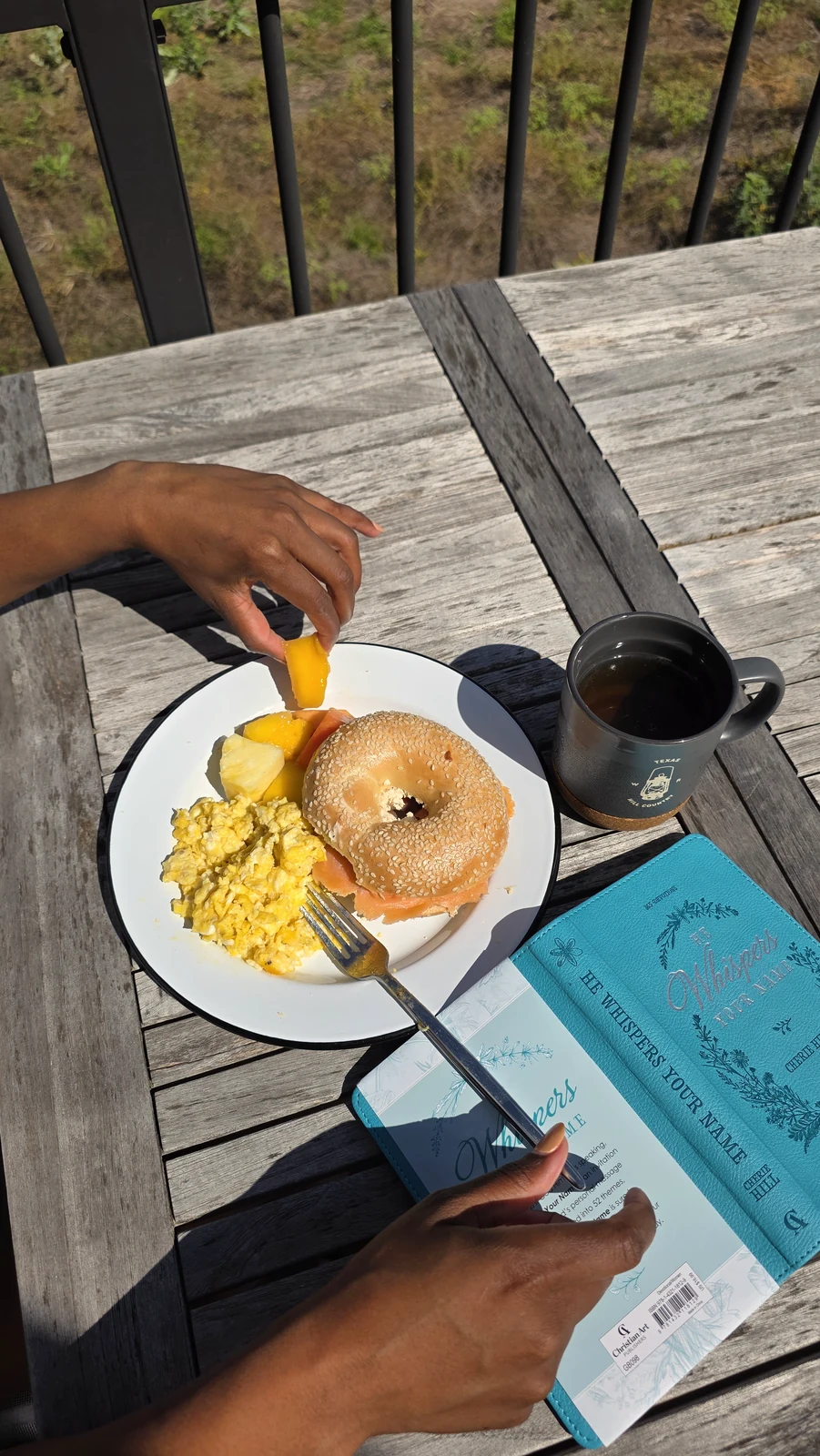 A quiet breakfast beside an open devotional